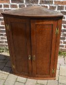 Georgian oak bow fronted corner cupboard