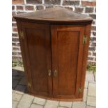 Georgian oak bow fronted corner cupboard