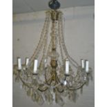 8 branch gilt metal chandelier with scro