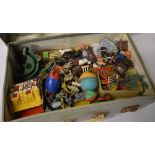 Suitcase of various farmyard toys includ