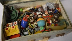 Suitcase of various farmyard toys includ