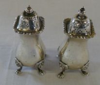 Pair of silver pepper pots total weight