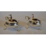 Pair of silver mustard pots with liners,