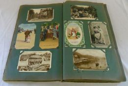 Postcard album containing miscellaneous