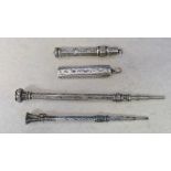 2 silver & 2 white metal propelling penc