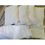 4 curled feather pillows with crochet pi