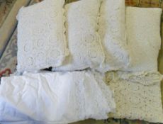 4 curled feather pillows with crochet pi