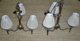 Pair of brass 3 branch light fittings wi