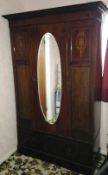 Edwardian mahogany wardrobe with oval mi