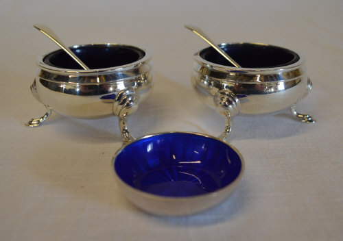 Pair of silver salts with matching silve