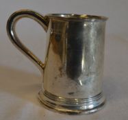 Silver tankard with engraved monogram, S