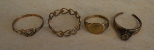 4 9ct gold rings, total weight 7g