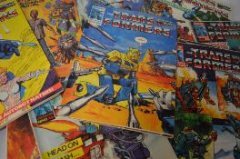 A large collection of 1980s Marvel Transformers comics, ranging from No 27 upto 141 (non