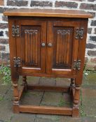 Small Old Charm cabinet with linen fold
