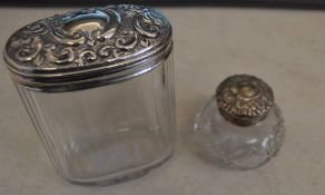 Silver topped dressing table pot & one o