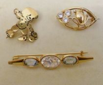 3 18ct gold brooches with non precious s