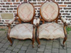 Pair of Victorian walnut open armchairs