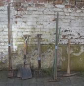 Various garden tools including spades, f