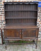 Dark oak dresser on turned legs with boa