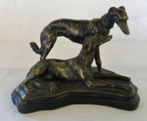 Bronze sculpture of 2 dogs