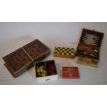 Old board games including chess, backgam