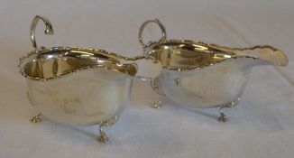Pair of Silver sauce boats, faded engrav