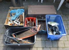 Large assortment of tools including saws