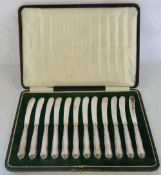 Cased set of silver handled butter knive