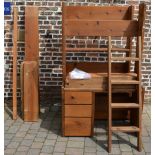 Substantial pine loft bed forming a high