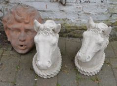 Pair of concrete horse heads & a terraco