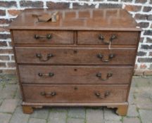 Georgian oak chest of drawers with swan