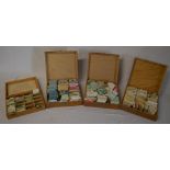 4 wooden boxes of new, old stock, watch