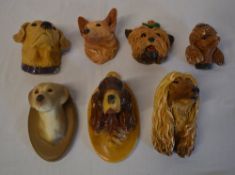7 wall plaques of dogs including Bossons