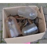 Box of clock parts including glass domes