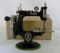 Miniature Singer Manfg.co sewing machine