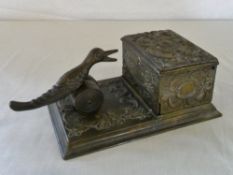 Bronze pick up a cigarette dispenser