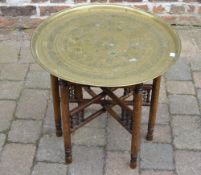 Asian brass table with folding legs