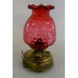 Late Victorian oil lamp with cranberry g