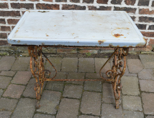 Wrought iron table with enamel top