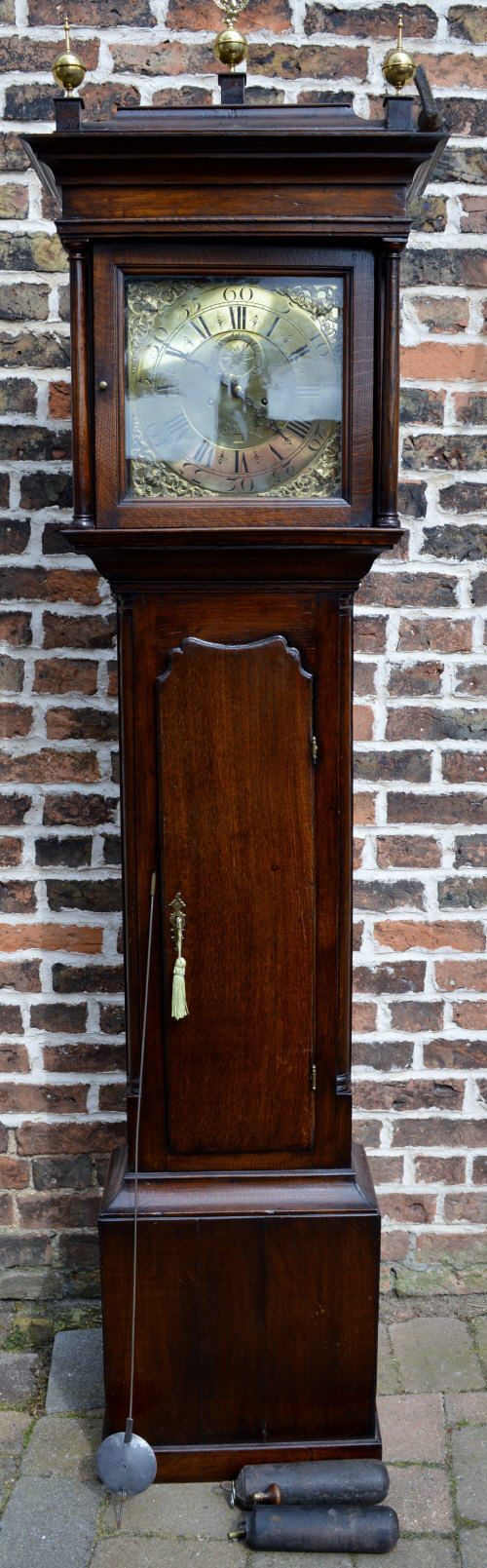 Georgian 8 day brass face longcase clock by James Kirkham, Holywell in an oak case with quarter