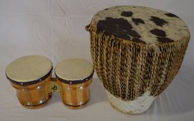 Animal skin drum & a set of bongos