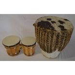 Animal skin drum & a set of bongos