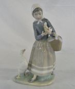 Lladro figure of a girl with ducklings a
