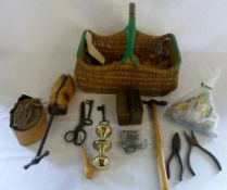 Wicker basket containing various tools,