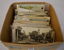 Box of various postcards