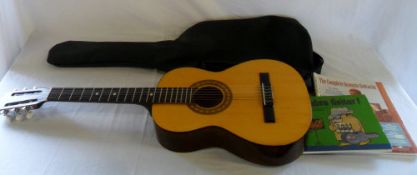 Half size acoustic guitar, case and musi