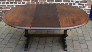 Circular draw leaf table extending to 16