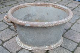 19th century tin foot bath with cast iro