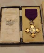 Cased OBE medal (Civil, Purple ribbon) H
