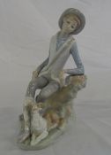 Lladro figurine of man with dog